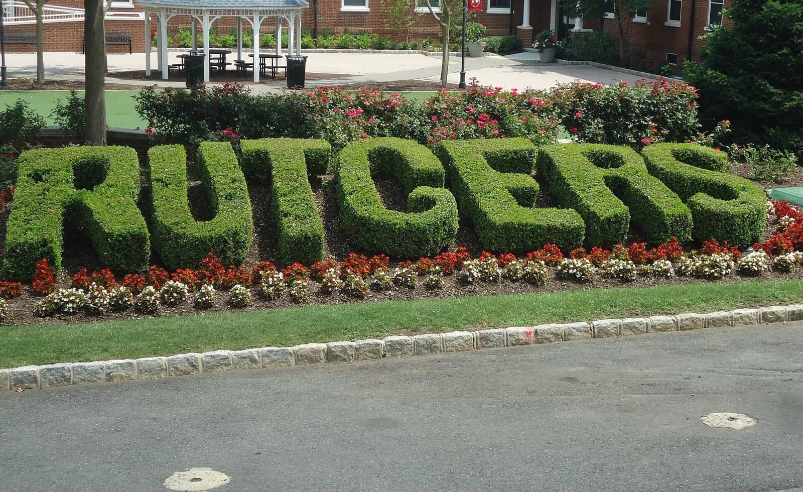 A hedge spelling out RUTGERS on the College Avenue campus