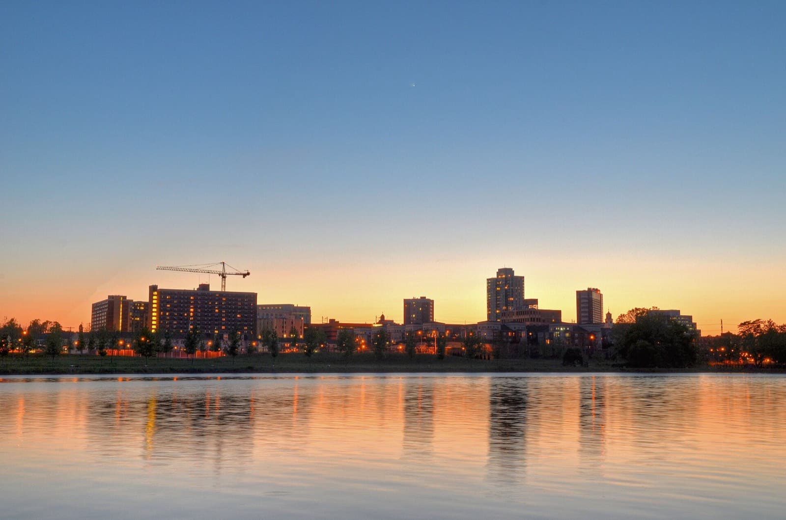 New Brunswick skyline at sunset, reflected in the Raritan River